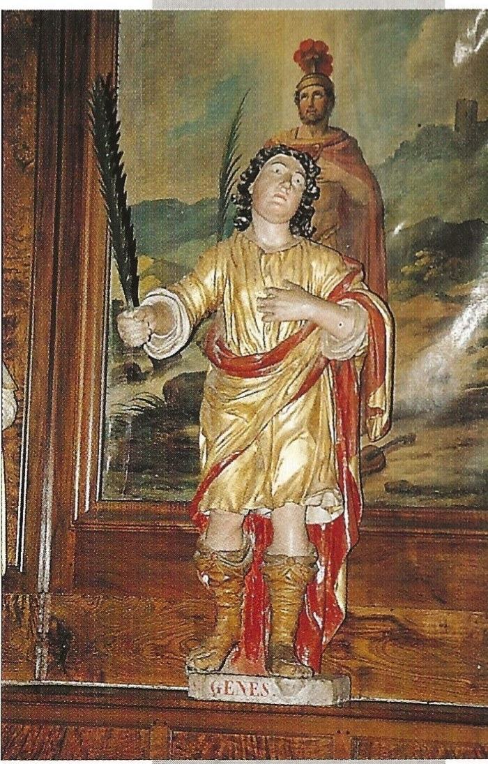 Statue polychrome de saint Genest, bois peint et doré du XVIIIᵉ siècle, dans l'église de Vendranges, tenant la palme du martyre.
